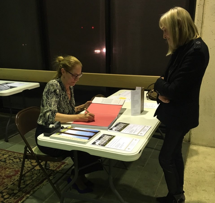 Ellis signing her book